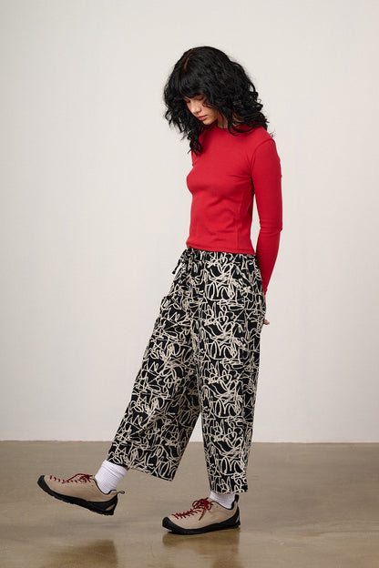 Chuck - Wide Leg Cotton Trousers in Black & White Graffiti Print