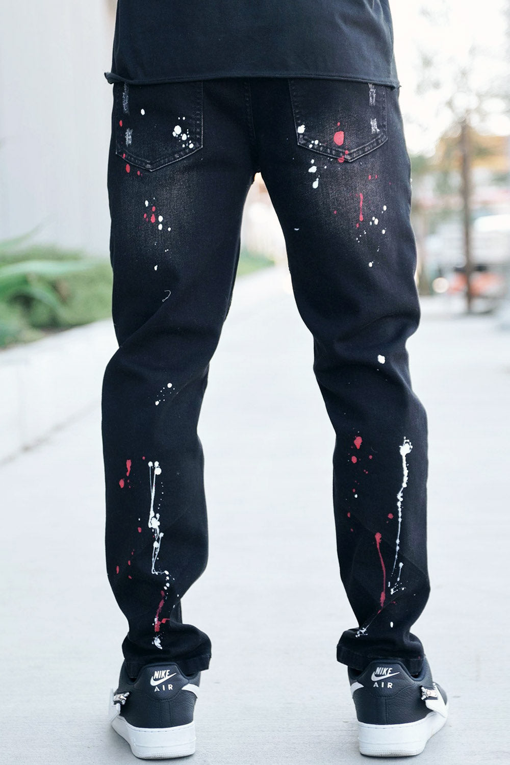 Stacked Paint Splatter Biker Jeans