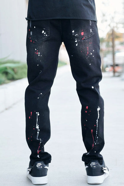 Stacked Paint Splatter Biker Jeans