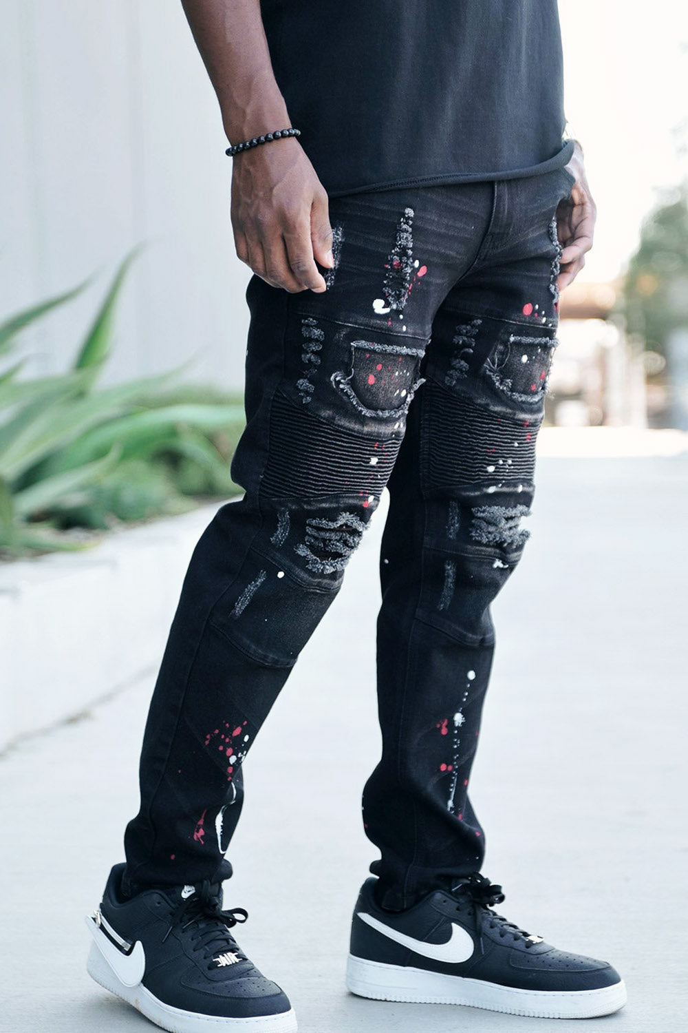 Stacked Paint Splatter Biker Jeans