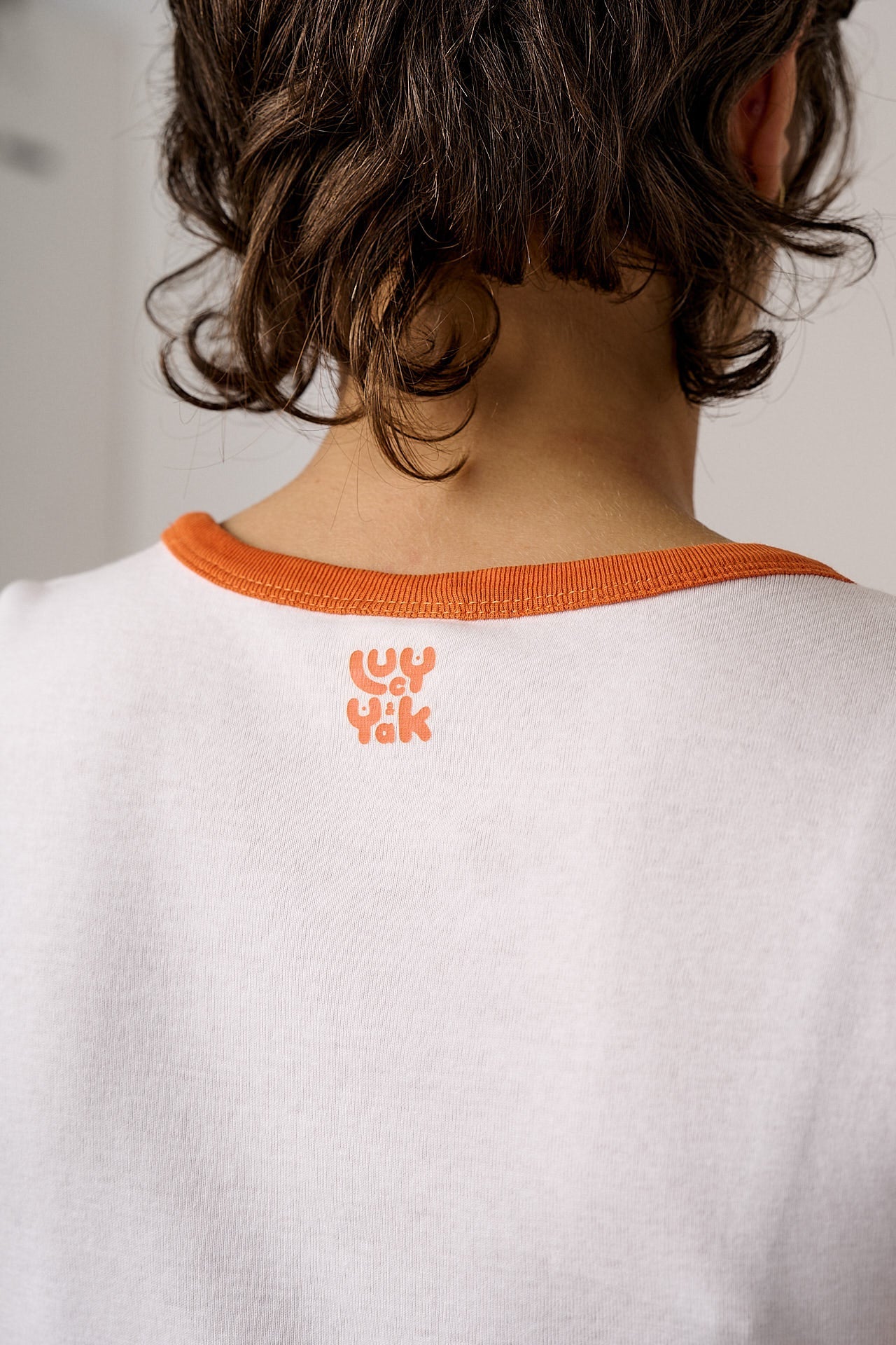 Fenn - Cotton Baby Tee in White with Rainbow Embroidery