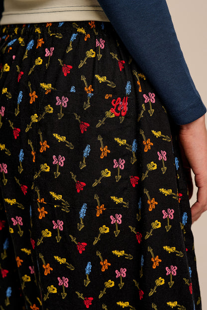 Renata - Cuffed Cotton Balloon Leg Trousers in Mini Tulips on Black